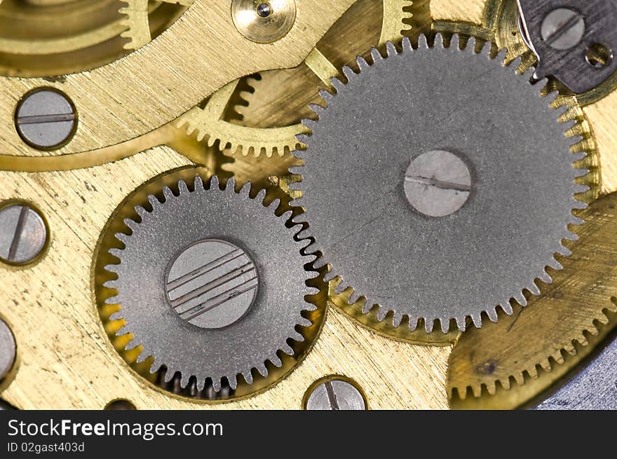 Close-up mechanism of old watch. Photo macro. Close-up mechanism of old watch. Photo macro