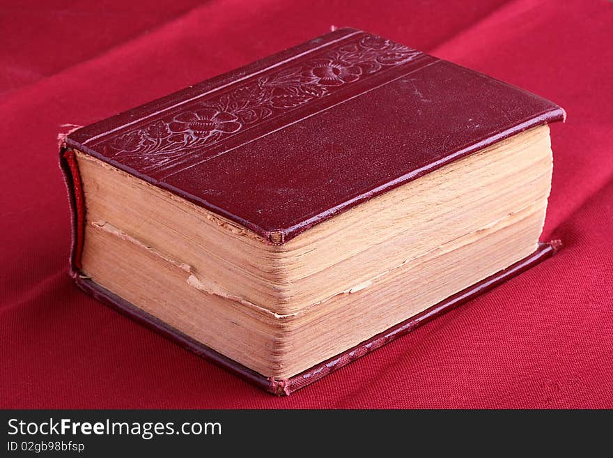 The ancient bible on a wooden table.