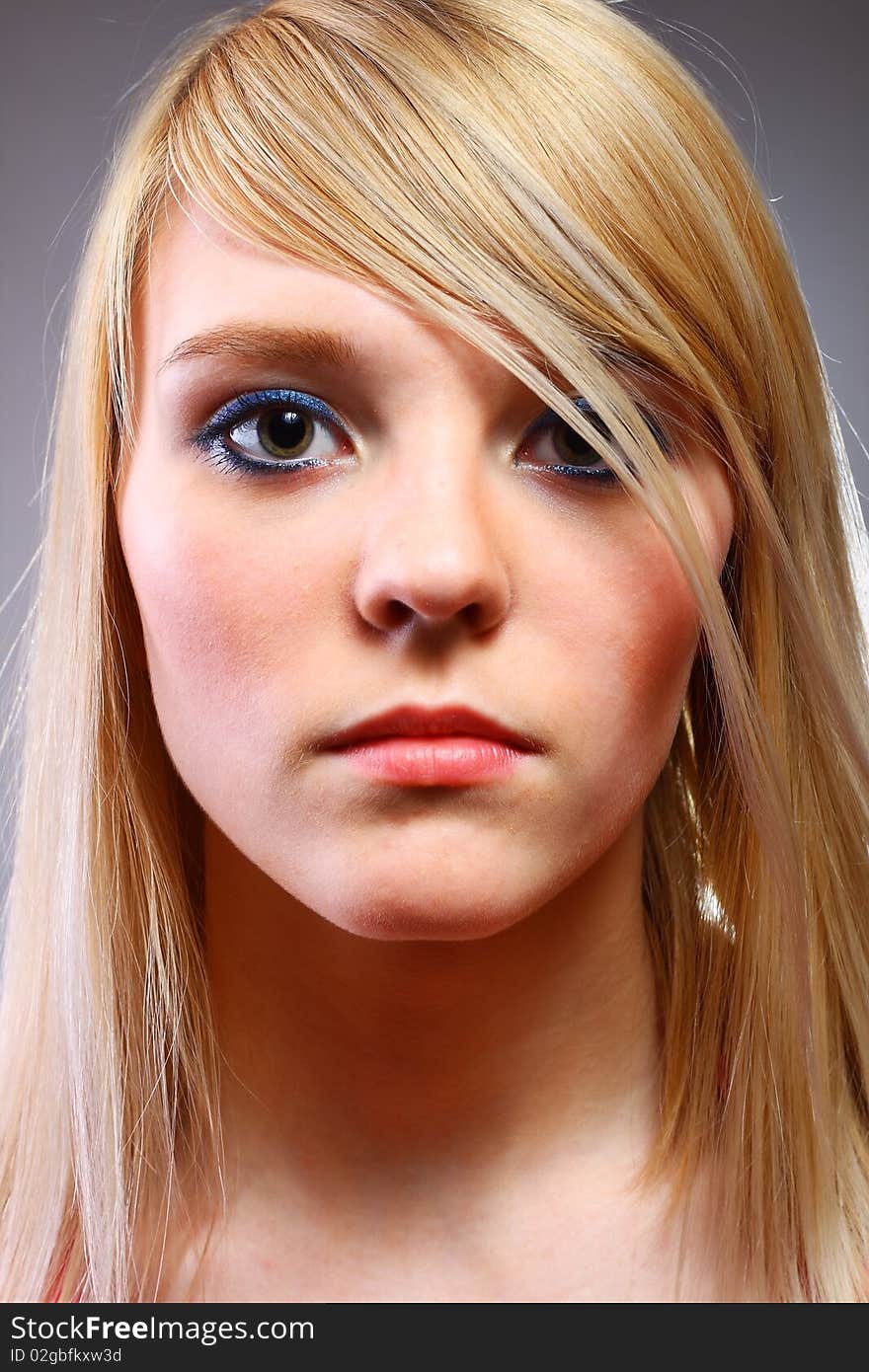 Portrait of beautiful blond woman, studio shot. Portrait of beautiful blond woman, studio shot