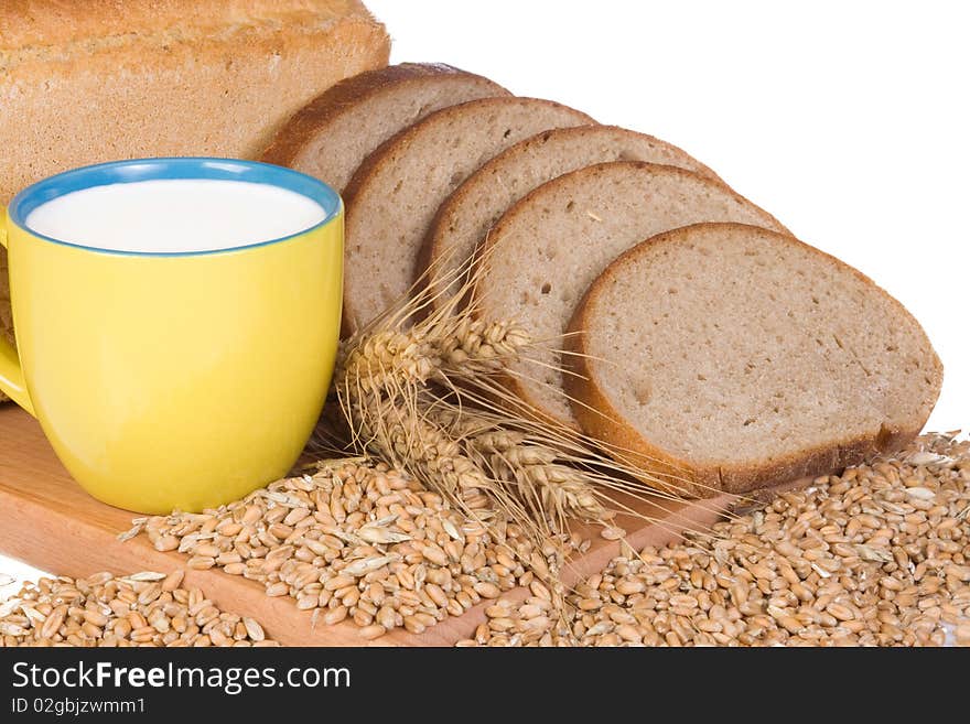 Cup ceramic with milk and bread