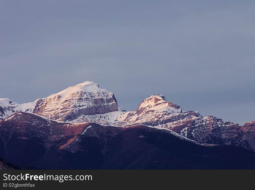 Last light of day on the snowy mountains of the Pyrenees, Spain. Last light of day on the snowy mountains of the Pyrenees, Spain