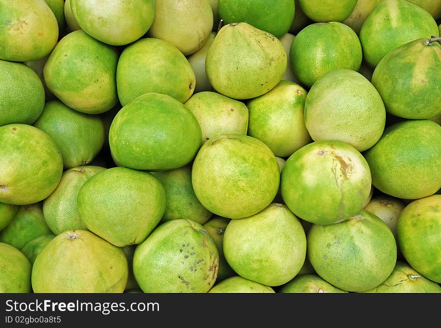 Green pomelo in the market