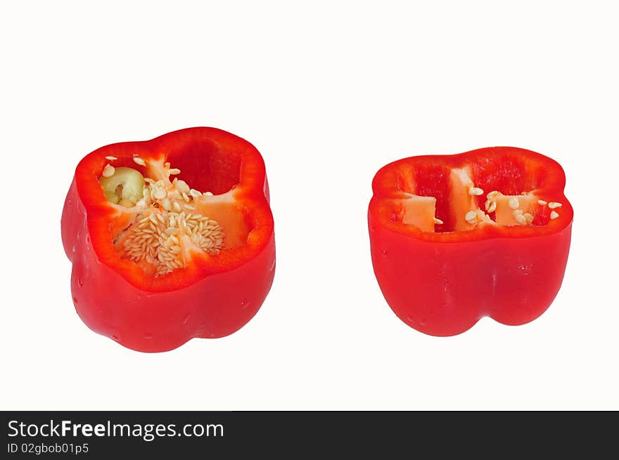 Half cut red pepper and seed