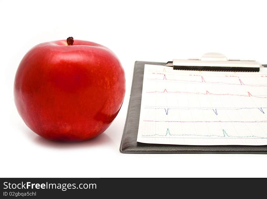 Plane-table with a cardiogram and apple on a white background for your illustrations