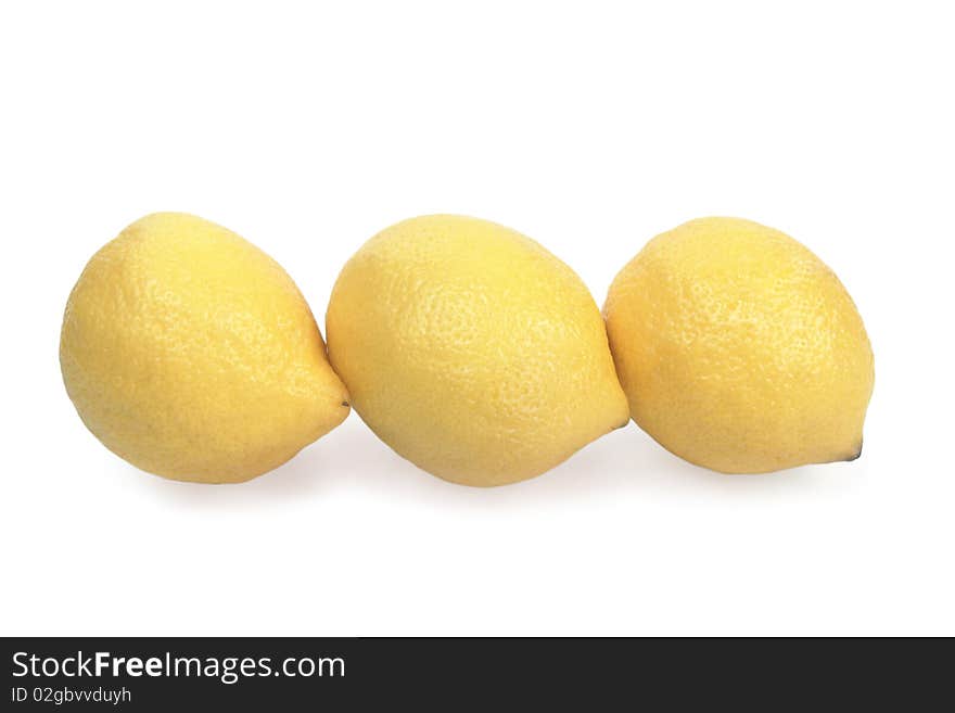 Juicy ripe lemons isolated on white background