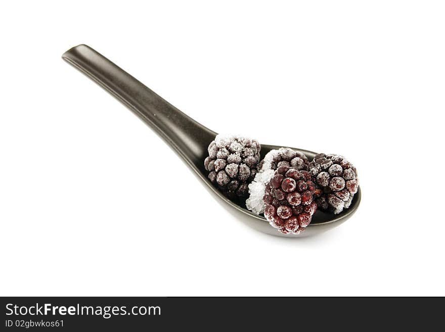 Frozen Blackberries on a Spoon