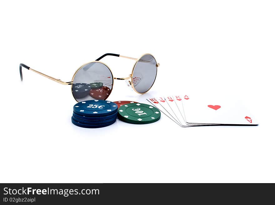 Chips of poker and playing cards on a white background for your illustrations