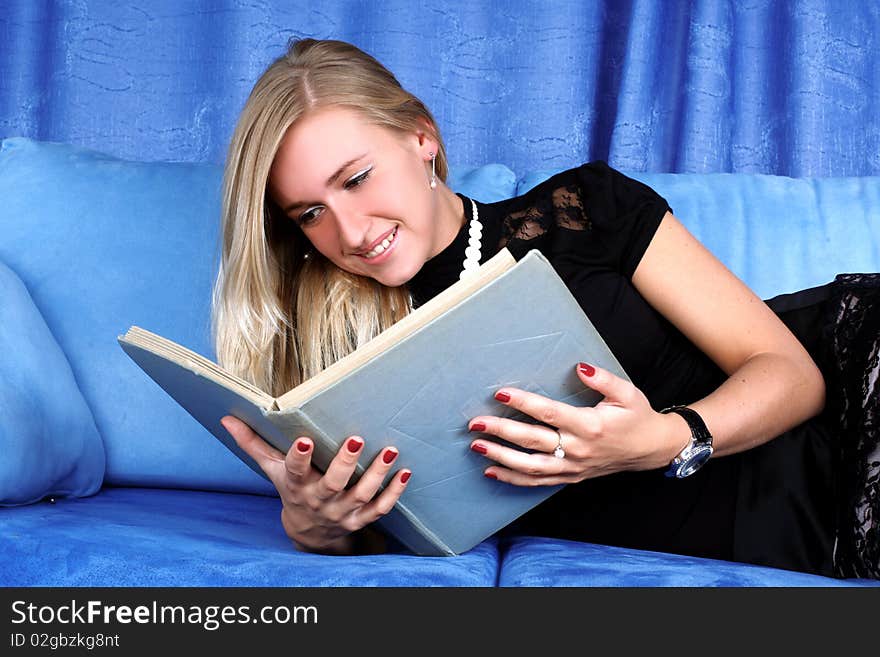 Woman read book at home