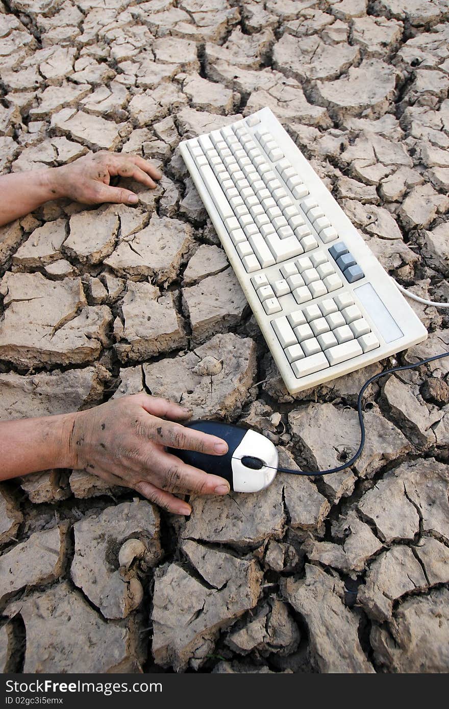 Hand keyboard earth crack