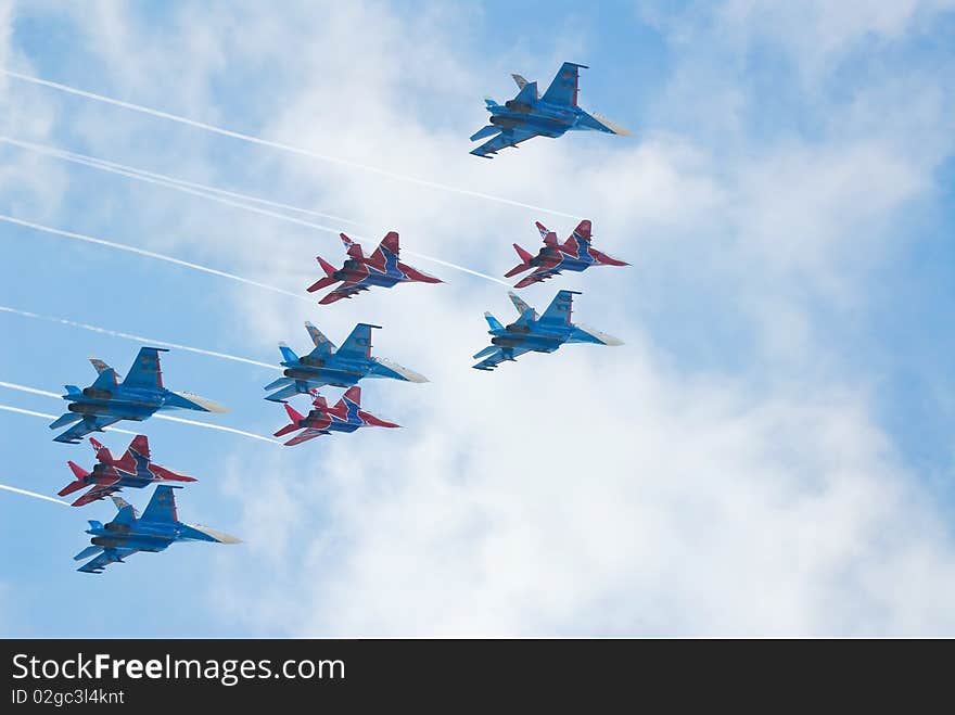 SU-27 and MIG-29 fighters performing aerobatics