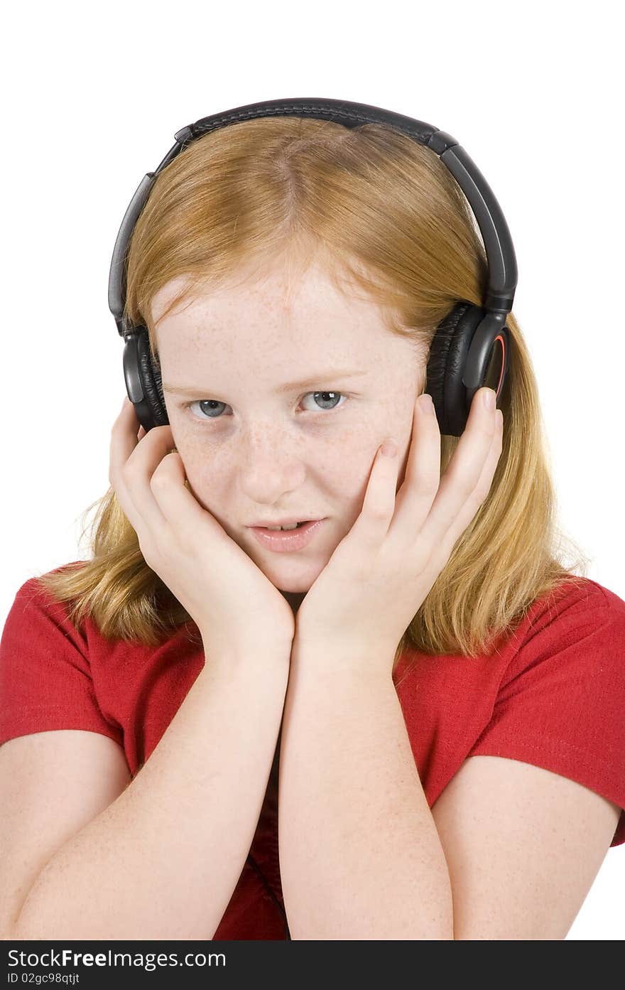 Girl is listening to music isolated on a white background. Girl is listening to music isolated on a white background