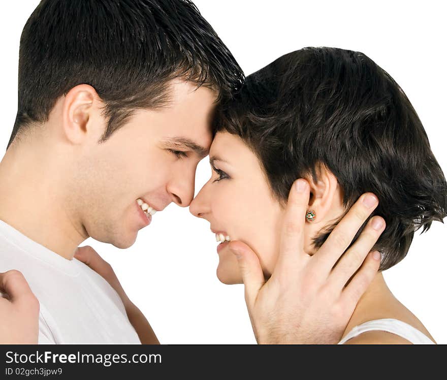 Profile of smiling young couple in love