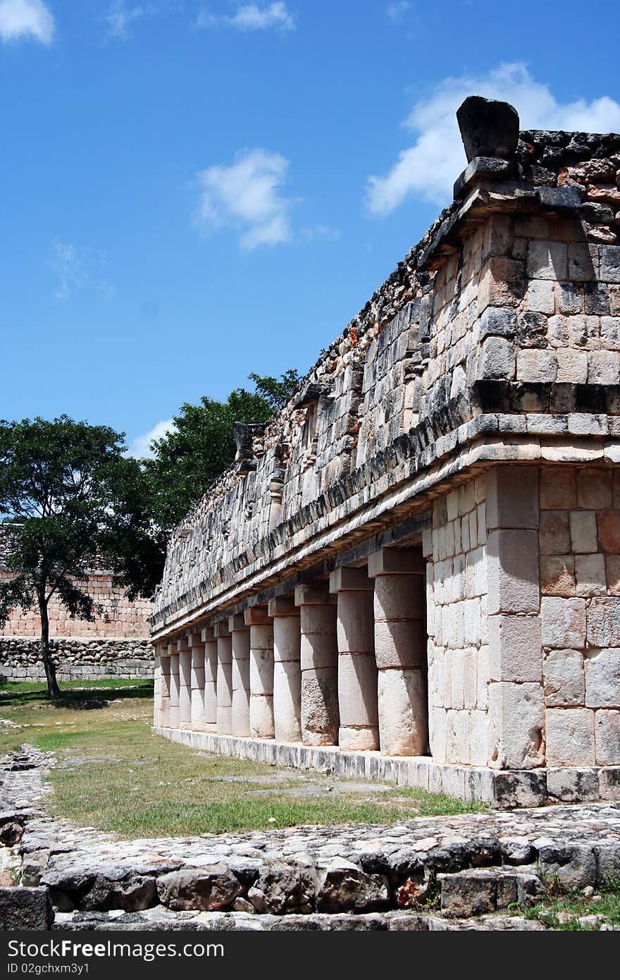 Detail of mexican maya public building with courtyard, portico and columns in Uxmal, Yucatan. Detail of mexican maya public building with courtyard, portico and columns in Uxmal, Yucatan