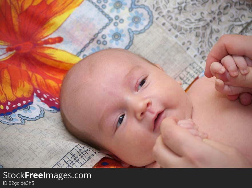 Photo of the baby with smile on face. Photo of the baby with smile on face