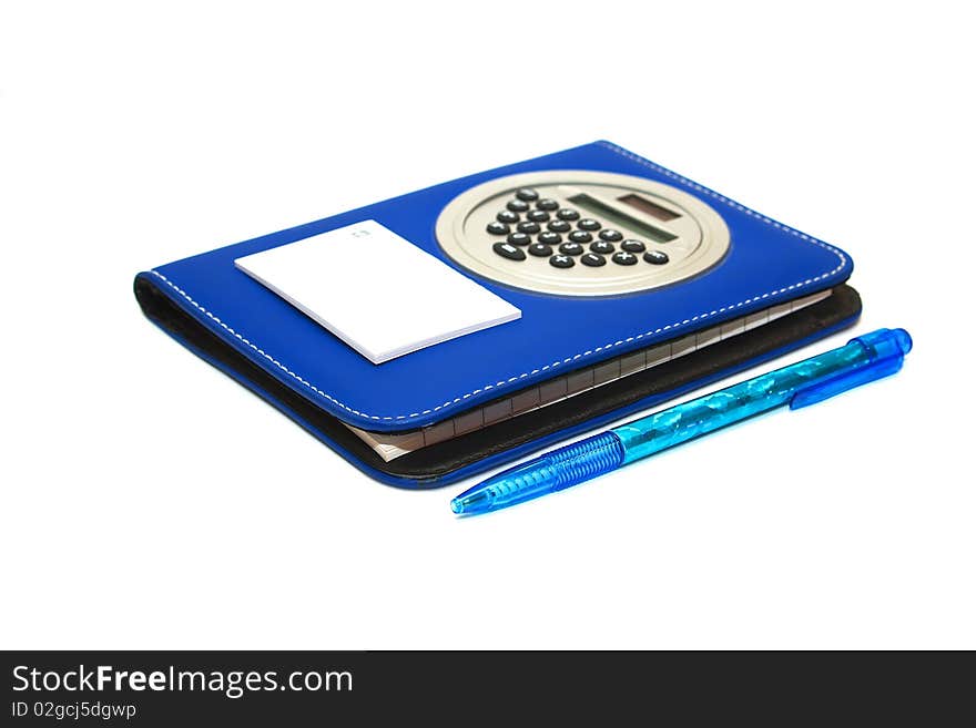 Photo of the note pad with pen on white background