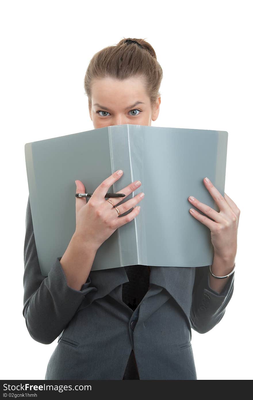 Portrait of a young businesswoman holding a folder