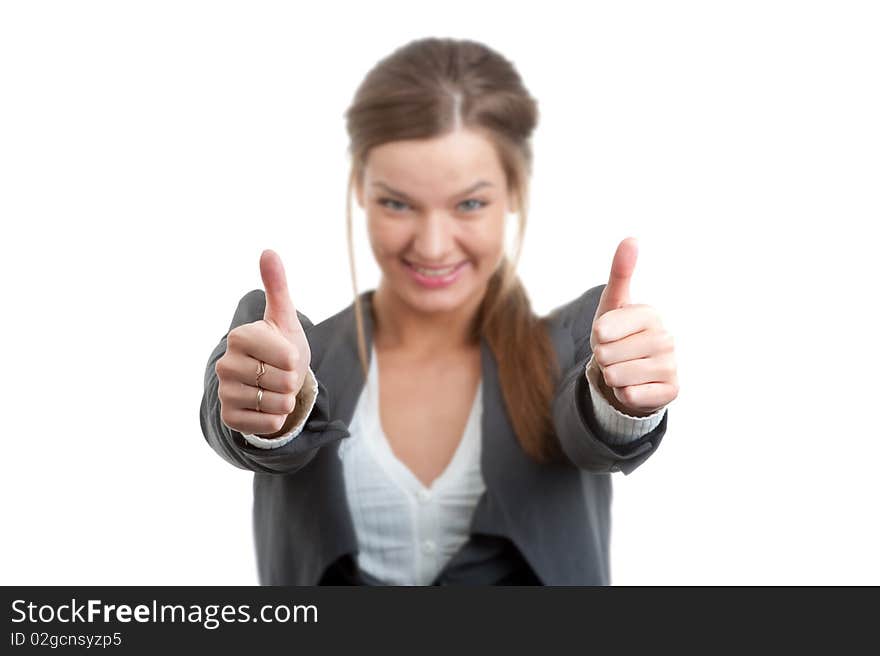 Portrait of a young businesswoman gesturing a thumbs up sign isolated over white. Portrait of a young businesswoman gesturing a thumbs up sign isolated over white