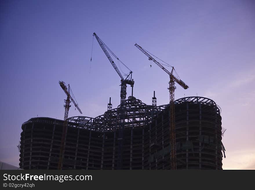 Construction site silhouette in the evening