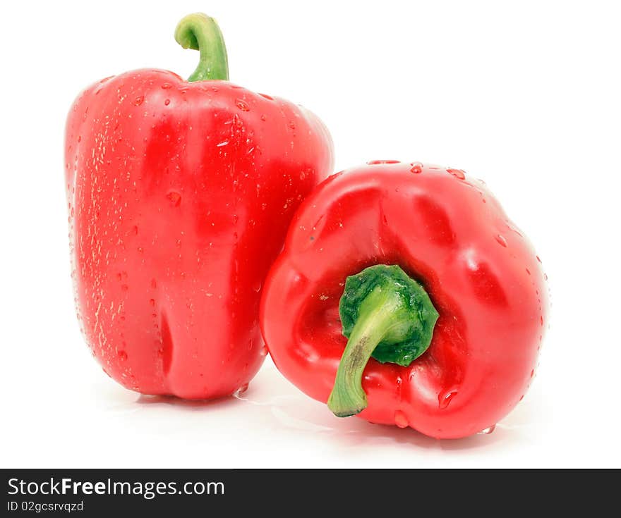 Fresh red bell peppers isolated on white. Fresh red bell peppers isolated on white