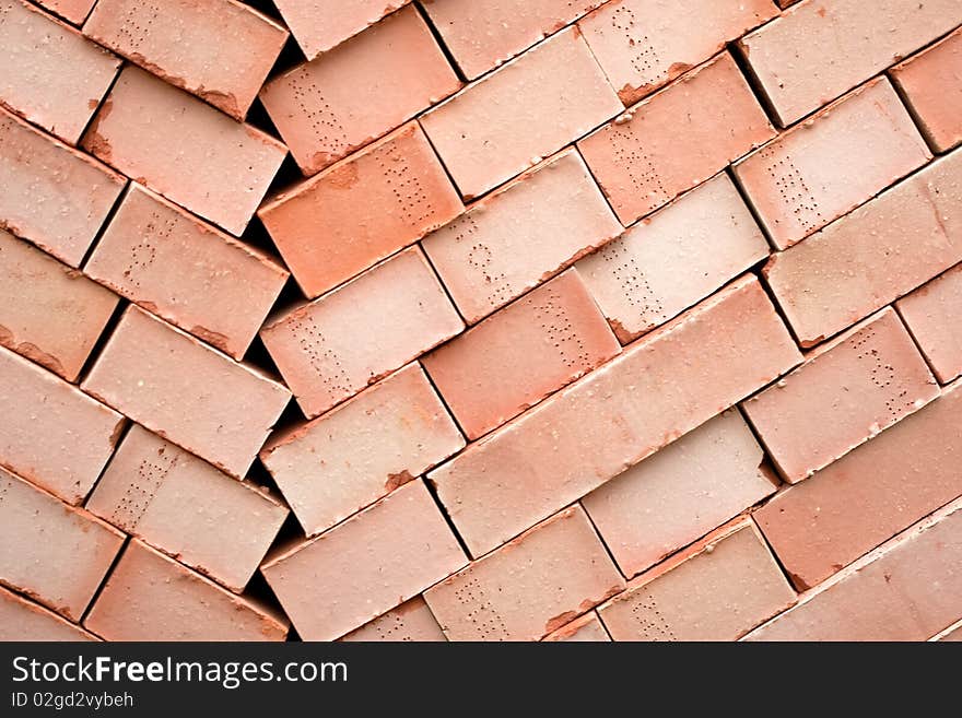 Background of many red bricks for cinstruction