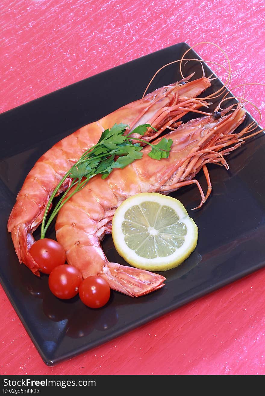 A couple of shrimps with lemon