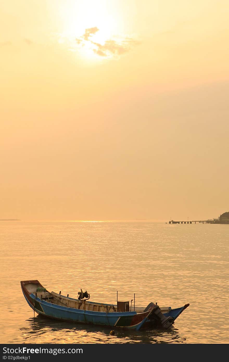 Sunset With Alone Boat