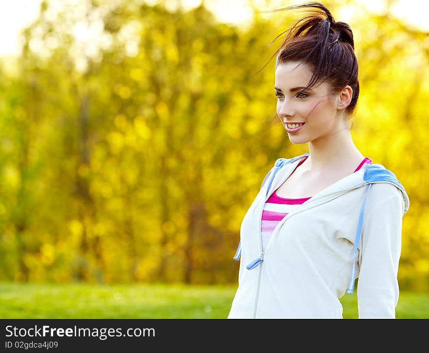 Fitness woman in yellow park. Fitness woman in yellow park