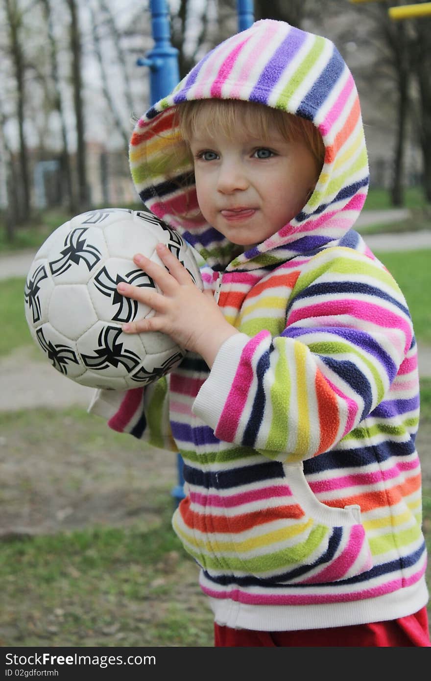 Girl on the walk is a large ball. Girl on the walk is a large ball