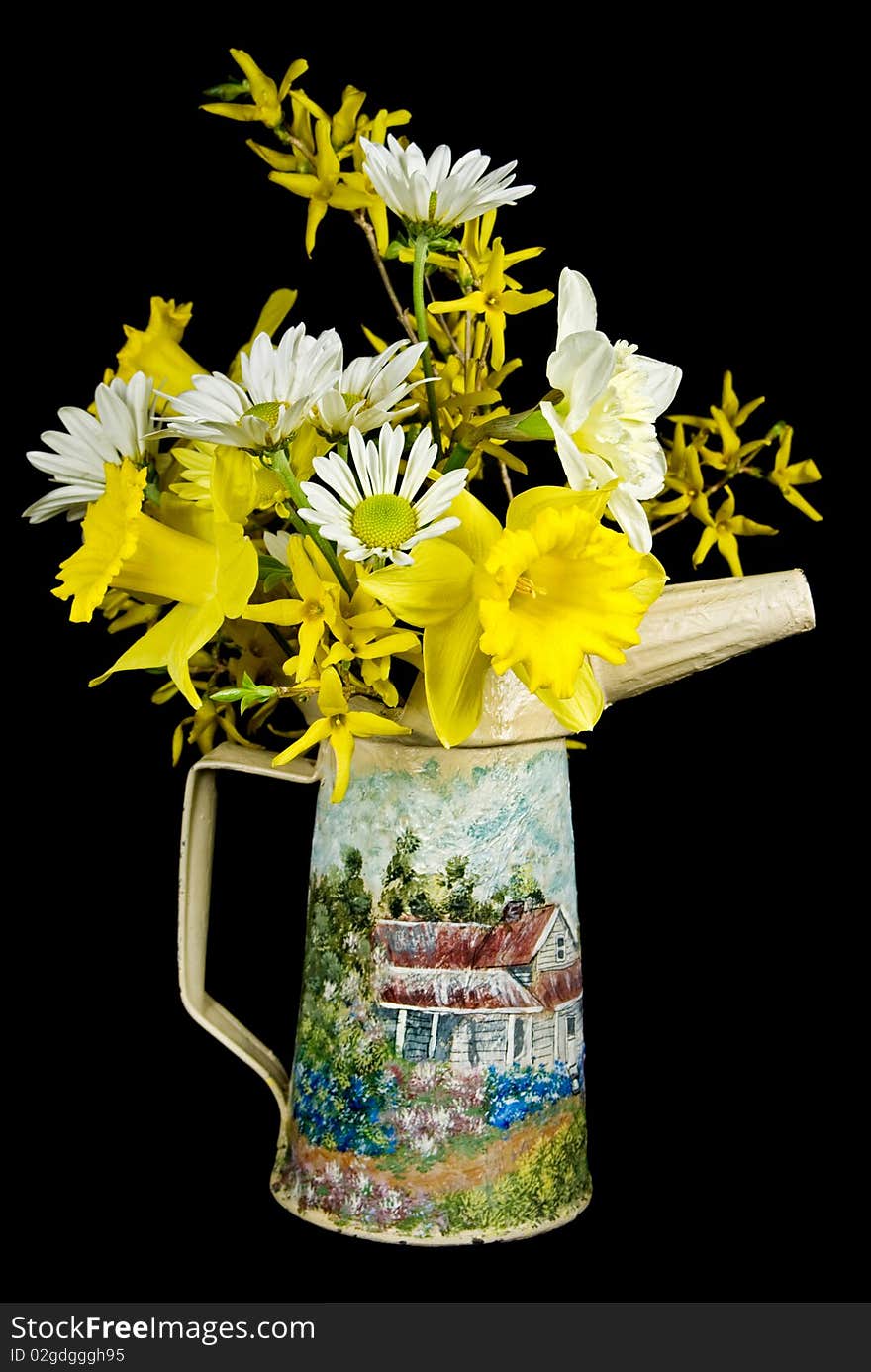 Spring bouquet in old oil can.