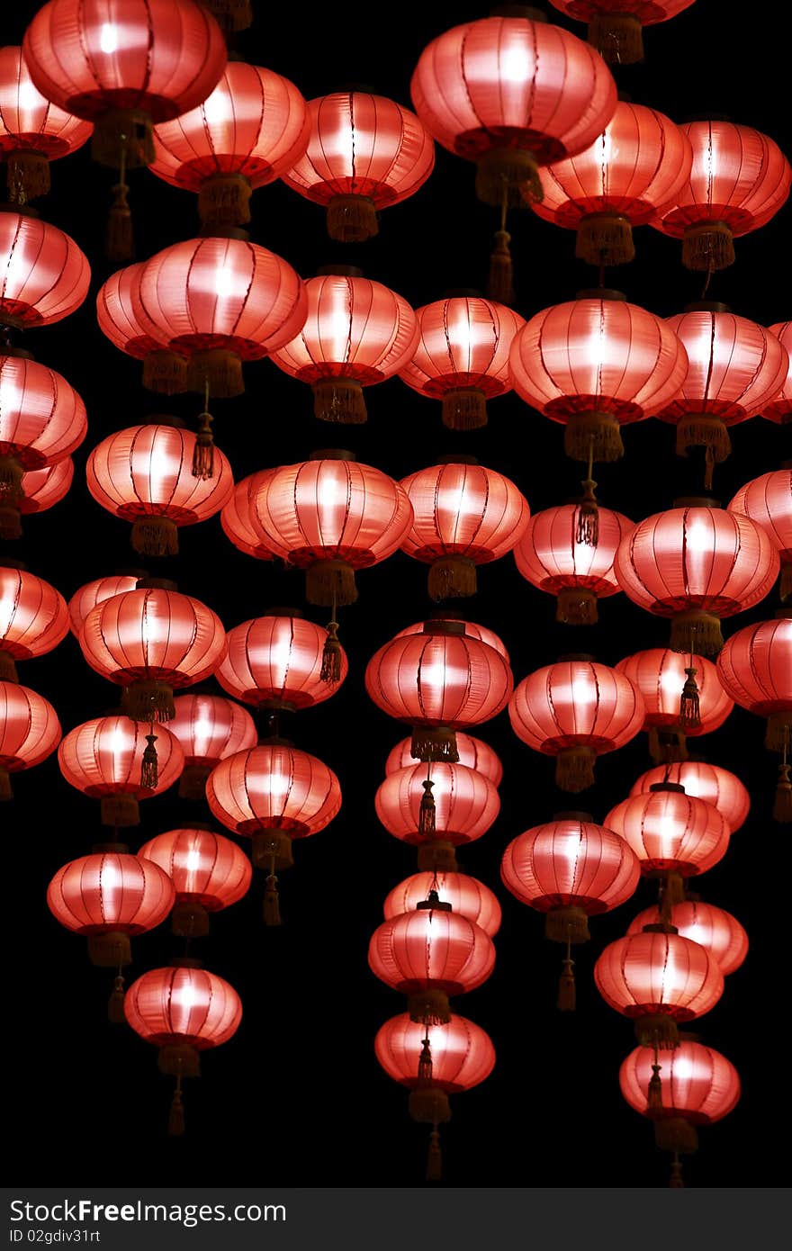 Big red lanterns will bring good luck and peace to prayer. It was at night in a chinese temple during Chinese New Year. Big red lanterns will bring good luck and peace to prayer. It was at night in a chinese temple during Chinese New Year.