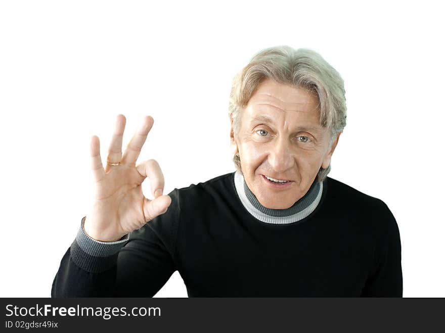 Senior shows OKAY sign isolated