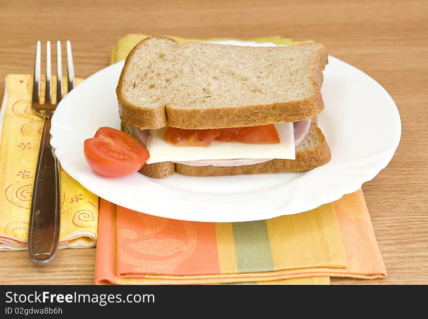 Ham, cheese, tomato and diet bread. Ham, cheese, tomato and diet bread