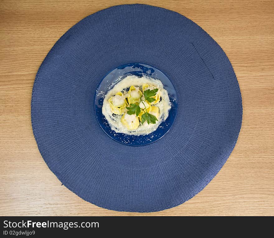 Tortellini with spinach and ricotta and white sauce. Tortellini with spinach and ricotta and white sauce