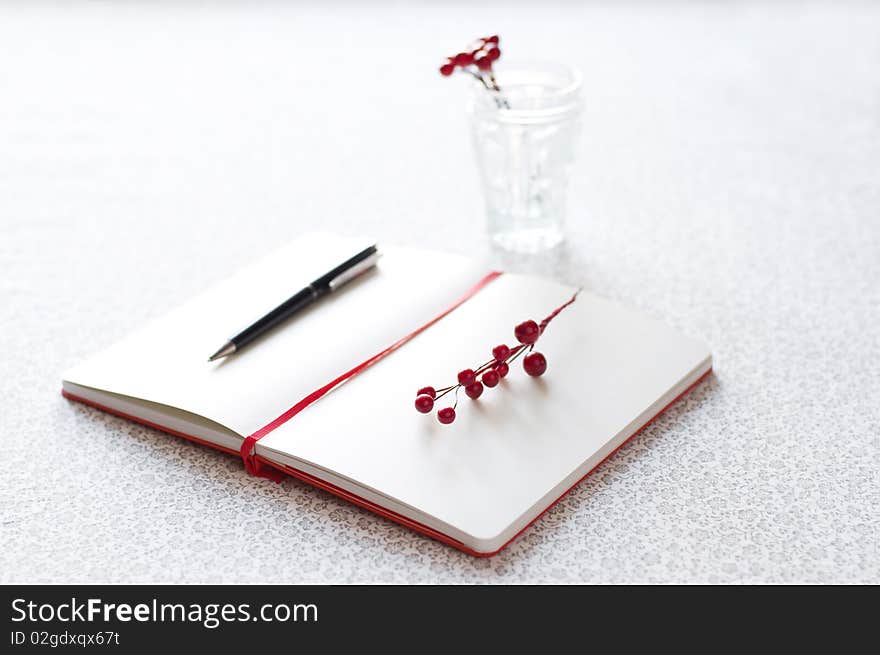 Romantic letter with pen and berries