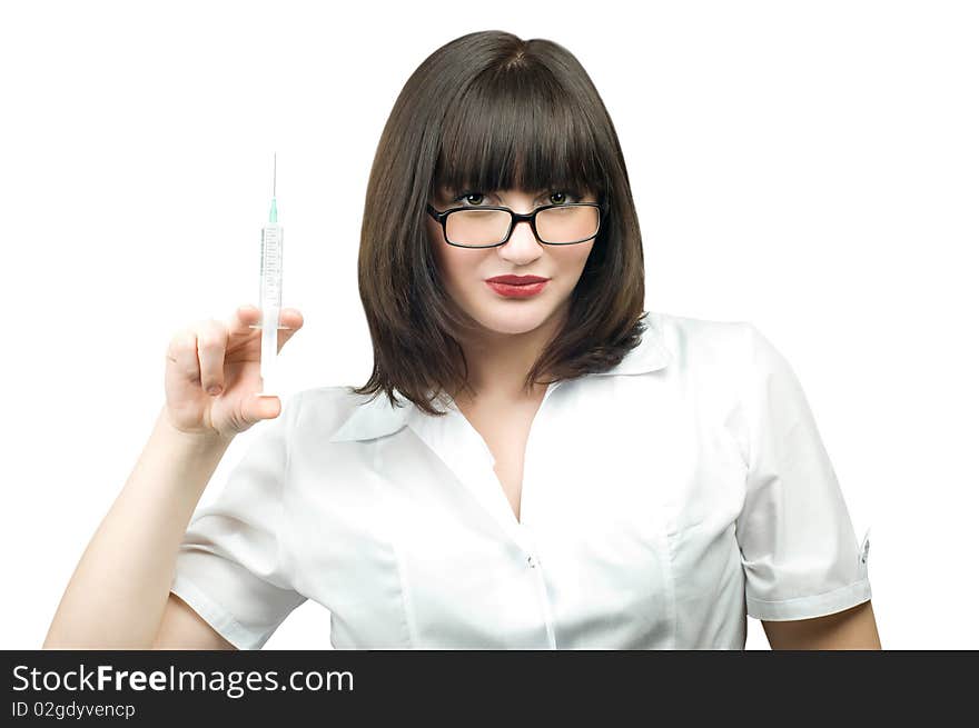 Beautiful young doctor with syringe in hand isolated on white background