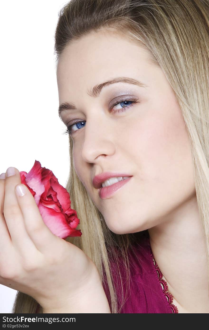 Woman in perfect skin face with rose in hand. Woman in perfect skin face with rose in hand