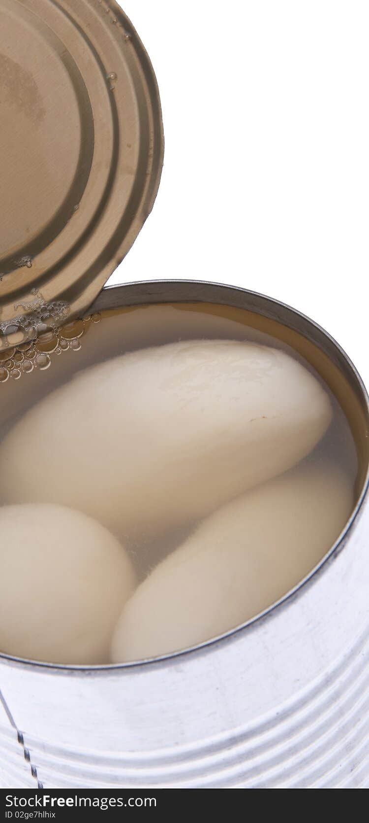 Close up of a can of white potatoes with copy spae.