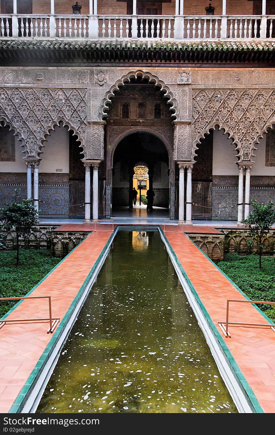 The main patio in Real Alcazar Palace in Seville, Spain. The main patio in Real Alcazar Palace in Seville, Spain