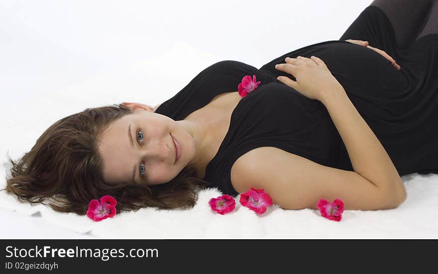 Beutiful Pregnant Woman with flowers