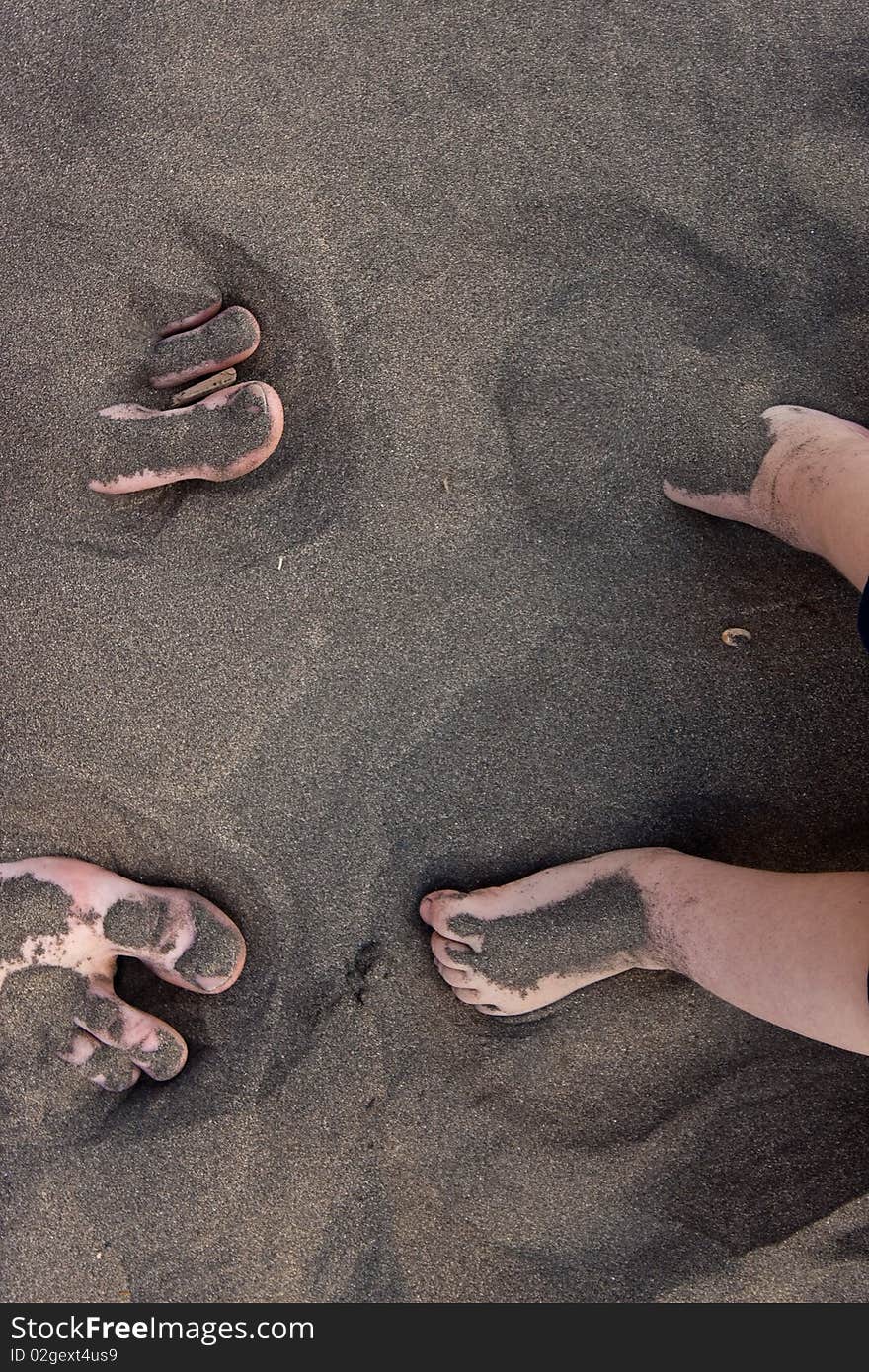 Feet in sand