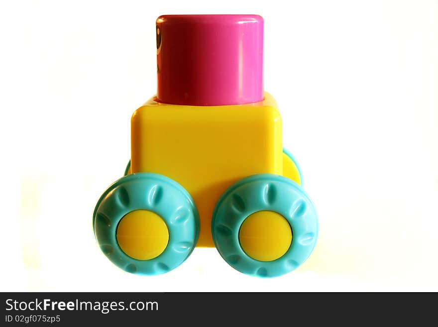 Toy block on wheels