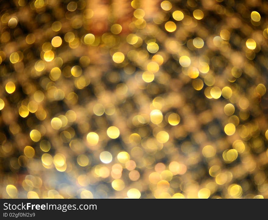 Abstract background consisting of many highlights golden