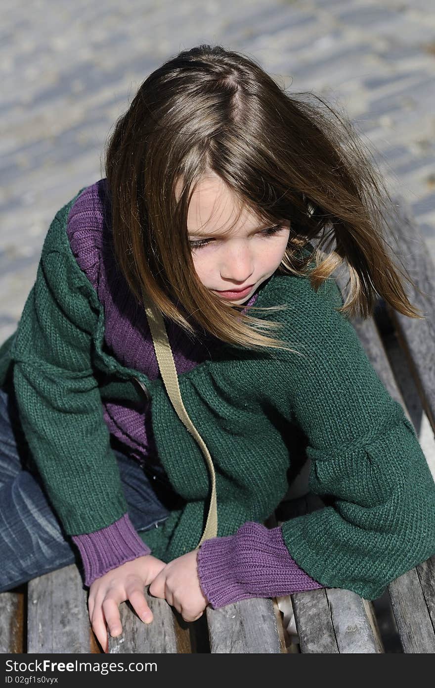 One child resting outside in spring season. One child resting outside in spring season