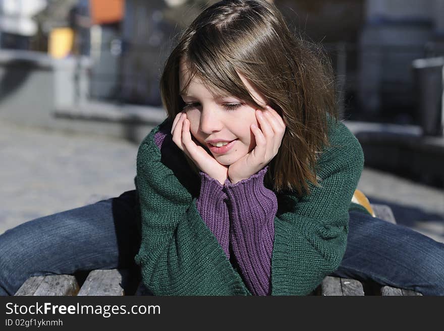 One happy child resting outside in spring season. One happy child resting outside in spring season