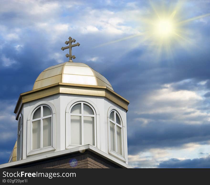 Church wity cross featuring sun in the background. Church wity cross featuring sun in the background.