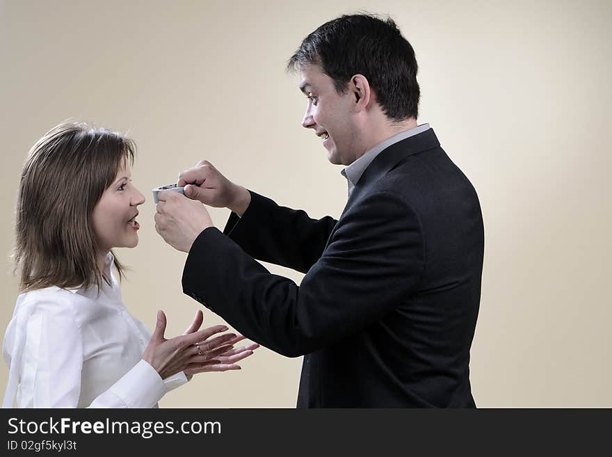 White business man gluing his partner mouth in office. White business man gluing his partner mouth in office