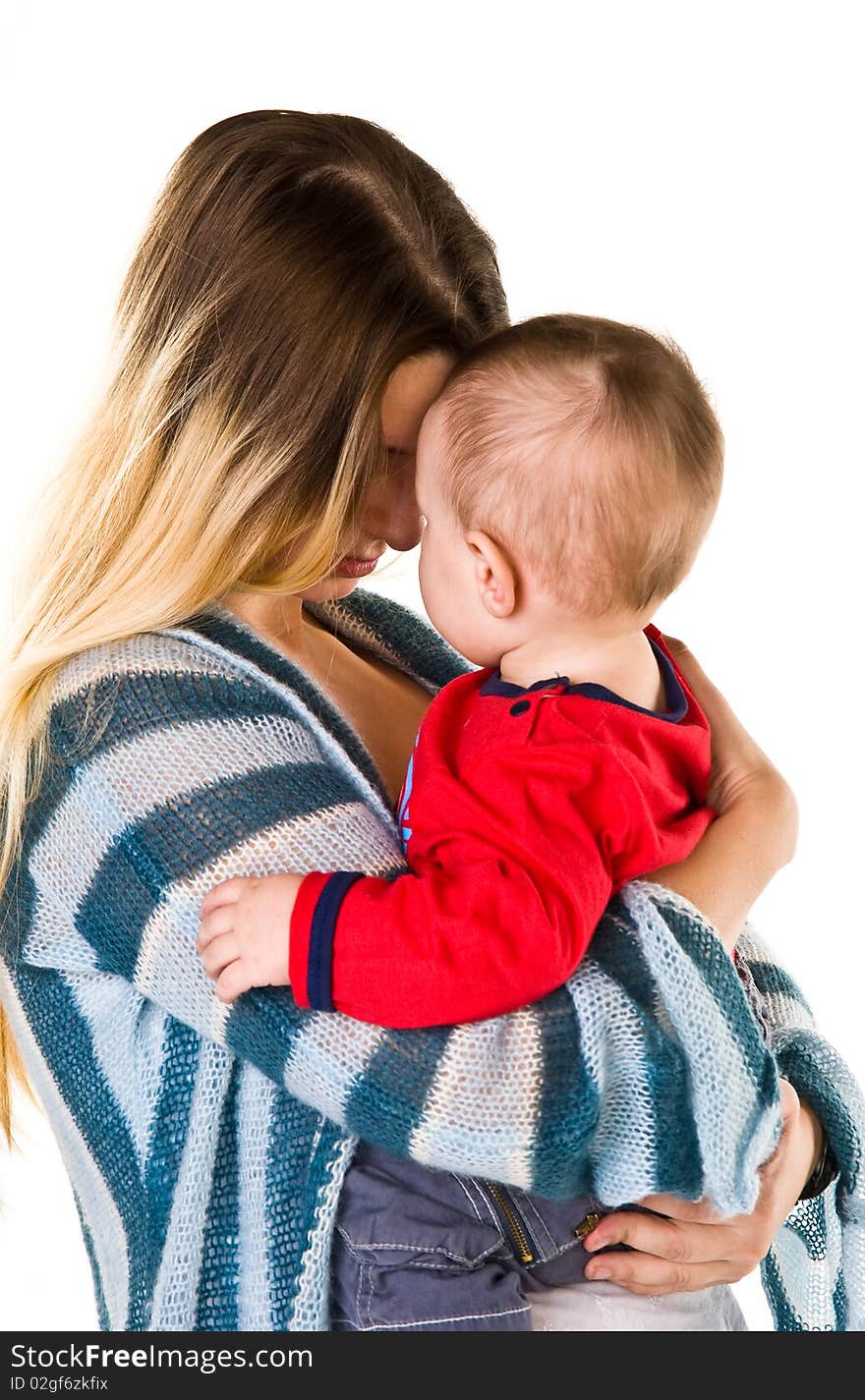 Happy mother hugs baby boy isolated on white. Happy mother hugs baby boy isolated on white