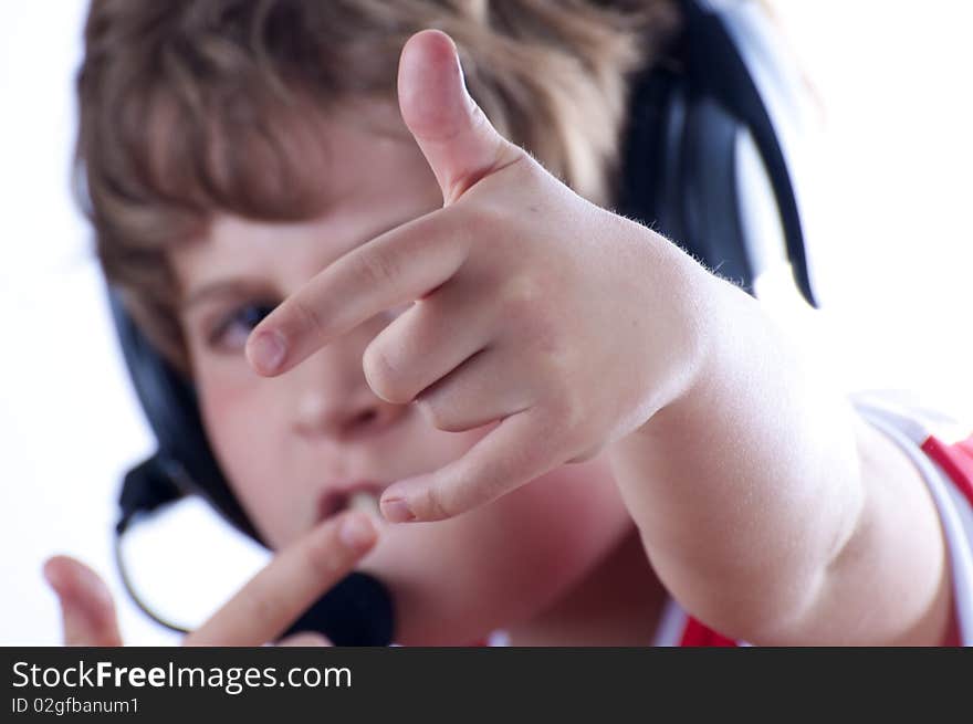 Picture of a boy listen music with headphones. Picture of a boy listen music with headphones