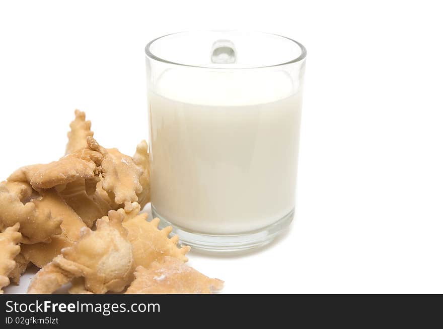 Cookies from wheat and a glass with milk. Cookies from wheat and a glass with milk