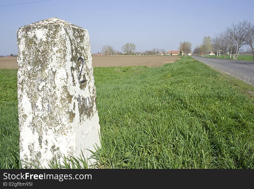 Kilometer stone outside a little village in Hungary.